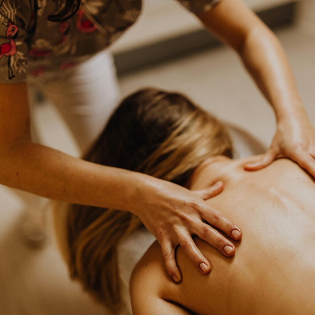 A soothing indoor massage therapy session focused on relaxation and wellness.