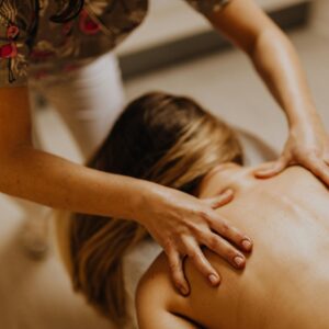 A soothing indoor massage therapy session focused on relaxation and wellness.
